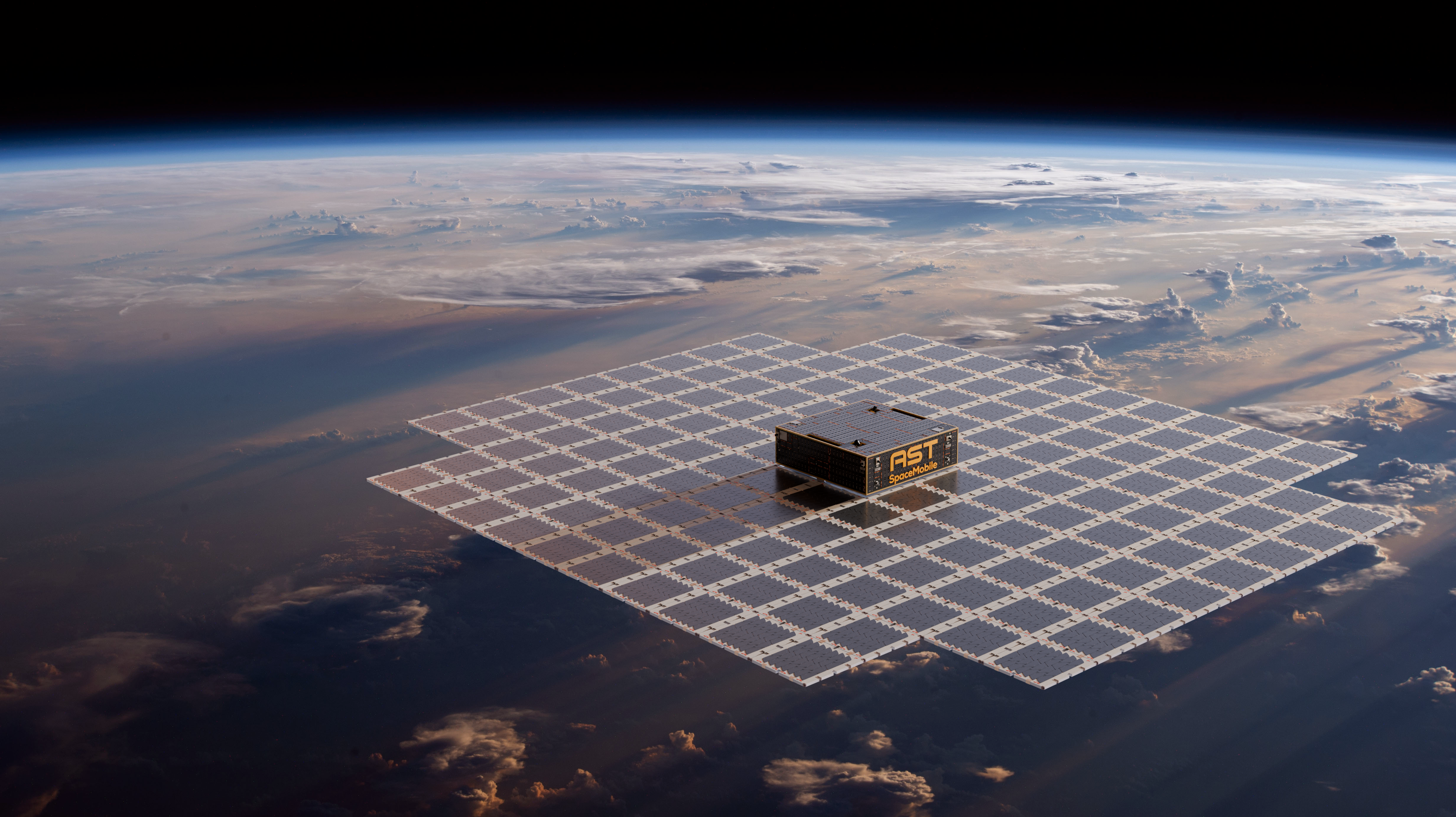 A computer rendering showing the sun-facing, solar cell-side of AST SpaceMobile's BlueWalker 3 test satellite in low Earth orbit. The spacecraft's Earth-facing phased array stretches about 693 sq ft. The satellite was used to conduct the first-ever voice calls, data downloads, video calls, and streaming video playback from unmodified phones connected directly to a satellite in space using terrestrial cellular frequencies.