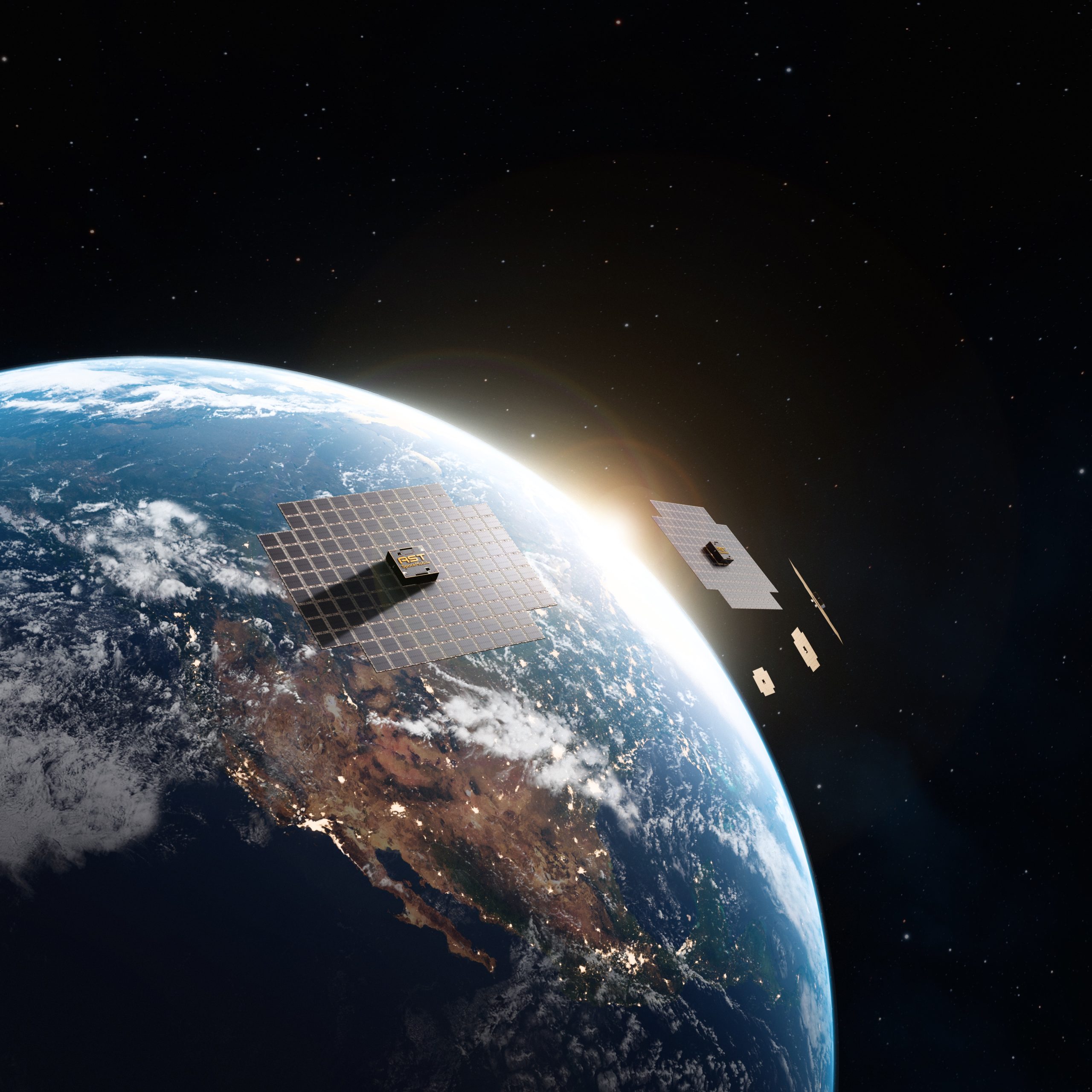 A computer rendering of AST SpaceMobile's five first-generation, Block 1 BlueBird commercial satellites in low Earth orbit. The spacecraft are designed to provide the first-ever space-based cellular broadband service to unmodified mobile phones. Five of the satellites launched on September 12, 2024 and unfolded throughout October 2024.